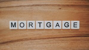 Scrabble letters forming the word “mortgage”